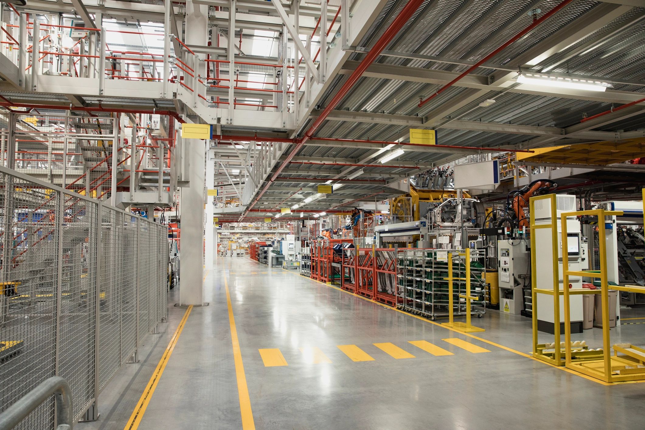 Industrial robot arm in a modern factory environment